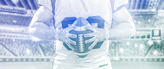 Image showing closeup American Football Player isolated on big modern stadium