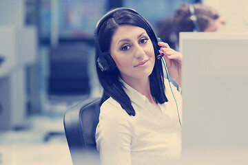 Image showing female call centre operator doing her job