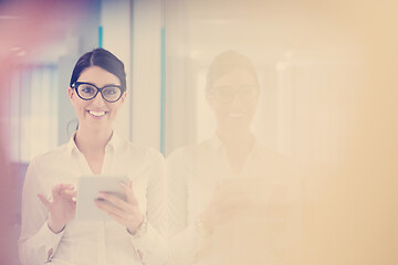 Image showing Business Woman Using Digital Tablet in front of startup Office