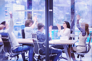 Image showing startup Group of young business people celebrating success