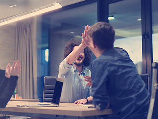 Image showing startup Group of young business people celebrating success