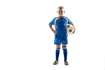 Image showing Young fit boy with soccer ball standing isolated on white