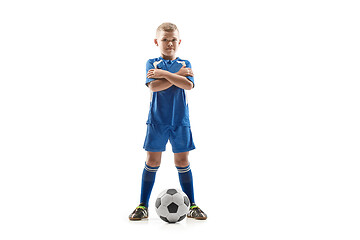 Image showing Young fit boy with soccer ball standing isolated on white