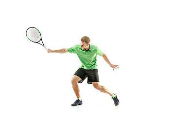 Image showing one caucasian man playing tennis player isolated on white background