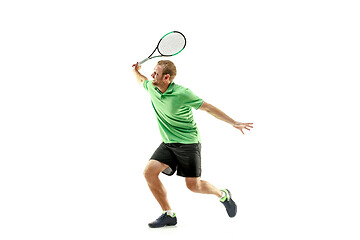 Image showing one caucasian man playing tennis player isolated on white background