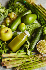 Image showing Green antioxidant organic vegetables, fruits and herbs placed on gray stone