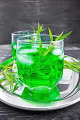 Image showing Lemonade Tarragon with ice in two glasses on board