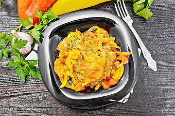 Image showing Chicken with pepper in plate on black board top