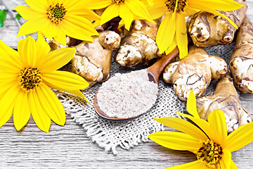 Image showing Flour of Jerusalem artichoke in spoon on old board