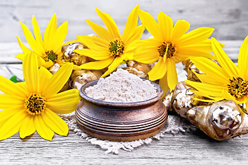 Image showing Flour of Jerusalem artichoke in bowl on board