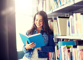 Image showing high school student girl reading book at library