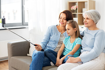 Image showing mother, daughter and grandmother taking selfie