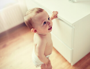 Image showing close up of happy little baby boy or girl at home