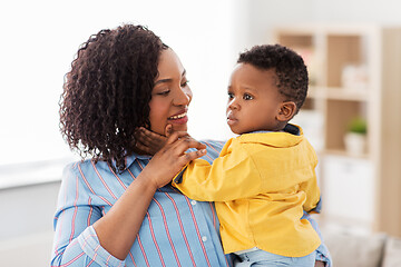 Image showing happy african american mother with baby at home