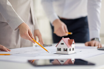 Image showing close up of architects discussing house project