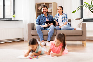 Image showing happy family spending free time at home