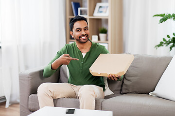 Image showing indian man with box of takeaway pizza at home