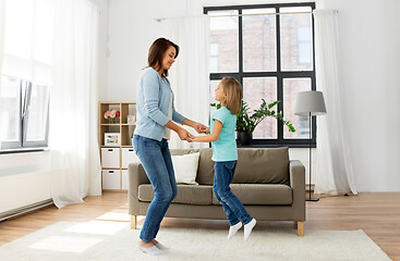 Image showing mother and daughter having fun at home