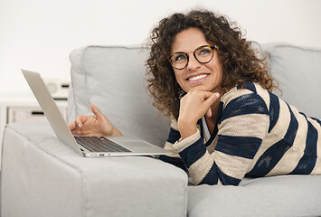 Image showing Beautiful woman working at home