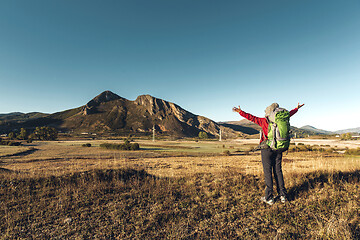 Image showing Backpack woman enjoying the view