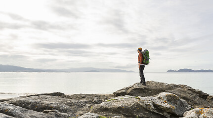 Image showing Man exploring the coast