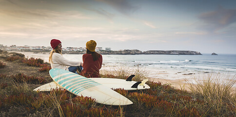 Image showing Surfer girls at the beach