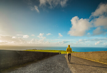 Image showing Walking by the road