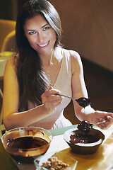 Image showing Staying at home woman preparing handmade vegetarian chocolate tr