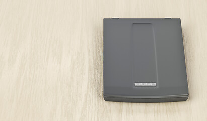 Image showing Image scanner on wood background