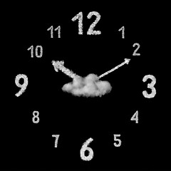 Image showing Creative clock made from white clouds on a black background.