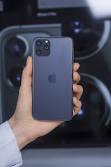 Image showing Hand holding new iPhone 11 Pro 