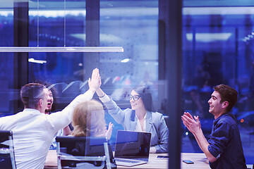 Image showing startup Group of young business people celebrating success