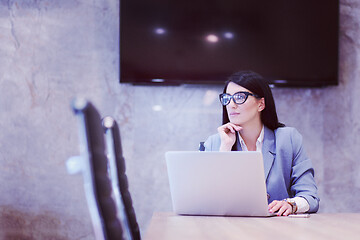 Image showing businesswoman using a laptop in startup office