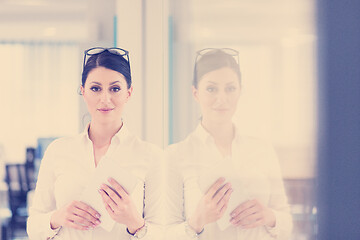 Image showing Business Woman Using Digital Tablet in front of startup Office