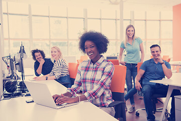 Image showing African American informal business woman working in the office