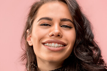 Image showing Beautiful young woman with teeth braces