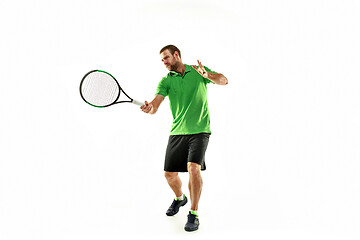 Image showing one caucasian man playing tennis player isolated on white background