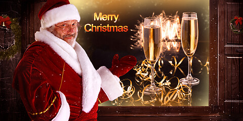 Image showing The man in costume of santa claus over night city background