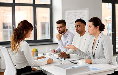 Image showing recruiters having job interview with employee