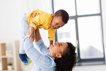 Image showing happy african american mother with baby at home