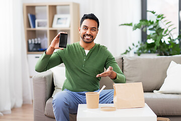 Image showing indian man using smartphone for food delivery