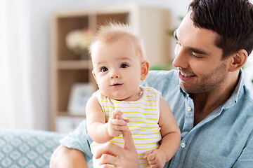 Image showing father with little baby daughter at home