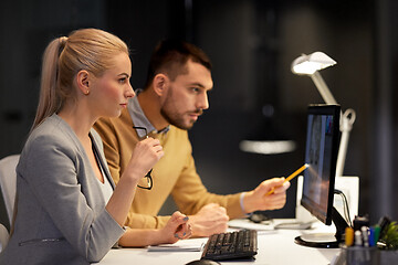 Image showing designers with computer working at night office