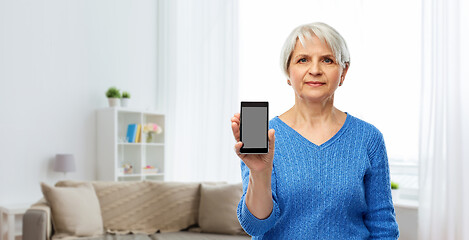 Image showing senior woman showing smartphone