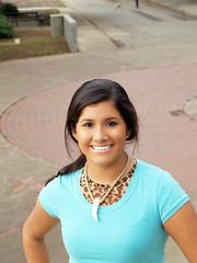 Image showing Young hispanic teen girl smiling outdoor portrait