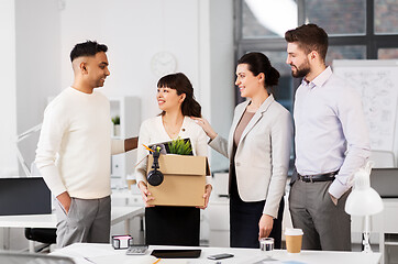 Image showing new female employee with colleagues at office