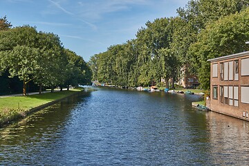 Image showing Amsterdam suburban district with water and parks