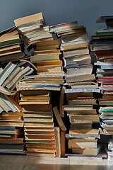 Image showing Wall of books piled up