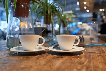 Image showing Having a cup of coffee