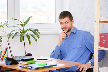 Image showing Confident specialist at the workplace in the office